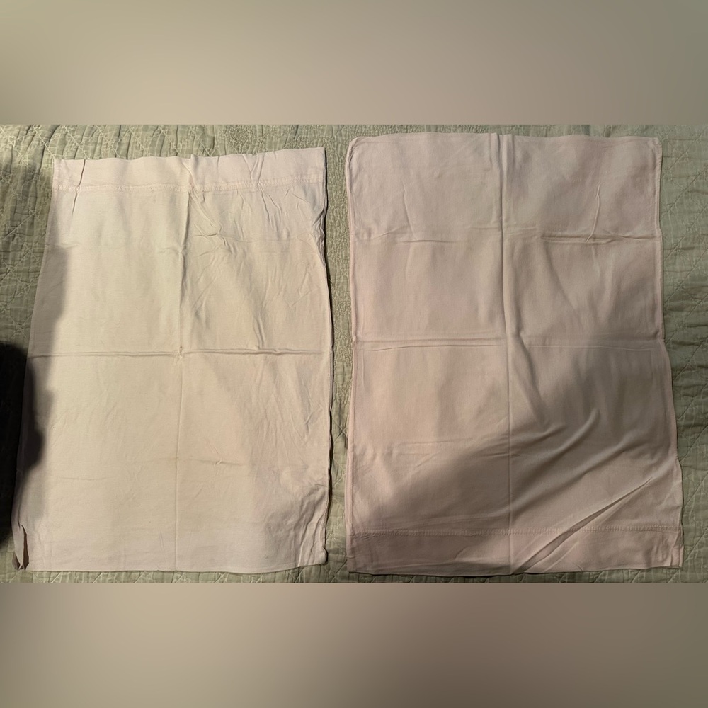 Set of Two light pink standard soft Pillowcases- 2 small stains.